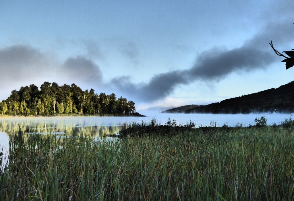 enjoying the beautiful scenery of lake tremblant in mont tremblant