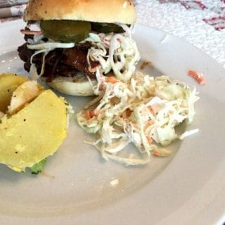 PULLED BEEF BBQ ON HOMEMADE BUNS WITH COLESLAW
