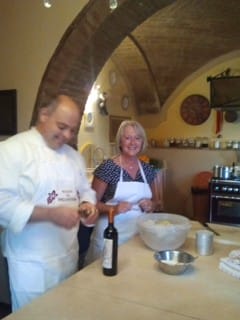 enjoying girlfriend travel at a cooking in Italy
