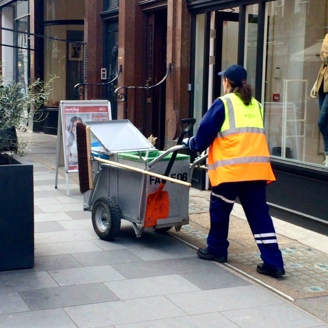 one of the really cool things to love about london, england street sweepers