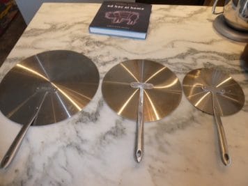 what features should you look for when buying pots and pans flat lids