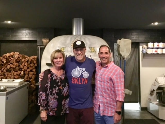 jason, sherry, and carl at paulie gee's miami learning how to make homemade pizza