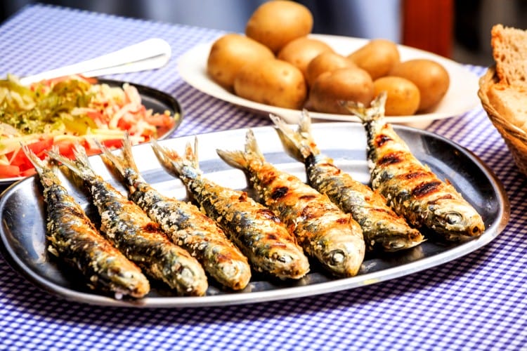 grilled sardines as traditional Portuguese food and drink