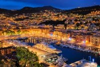 a view of the Old Port harbor in Nice at night