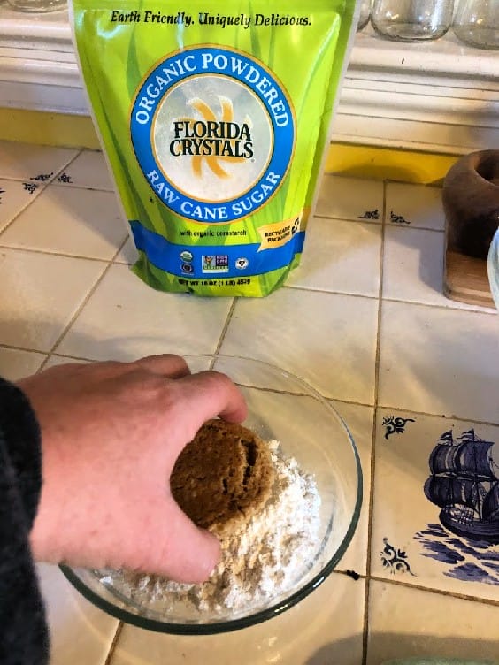 dipping oatmeal cookies in florida crystals powdered sugar