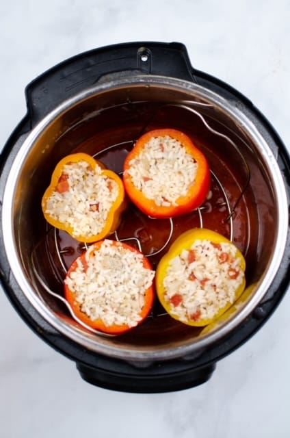 Cook these stuffed peppers recipe in the instapot for an easy dinner idea.